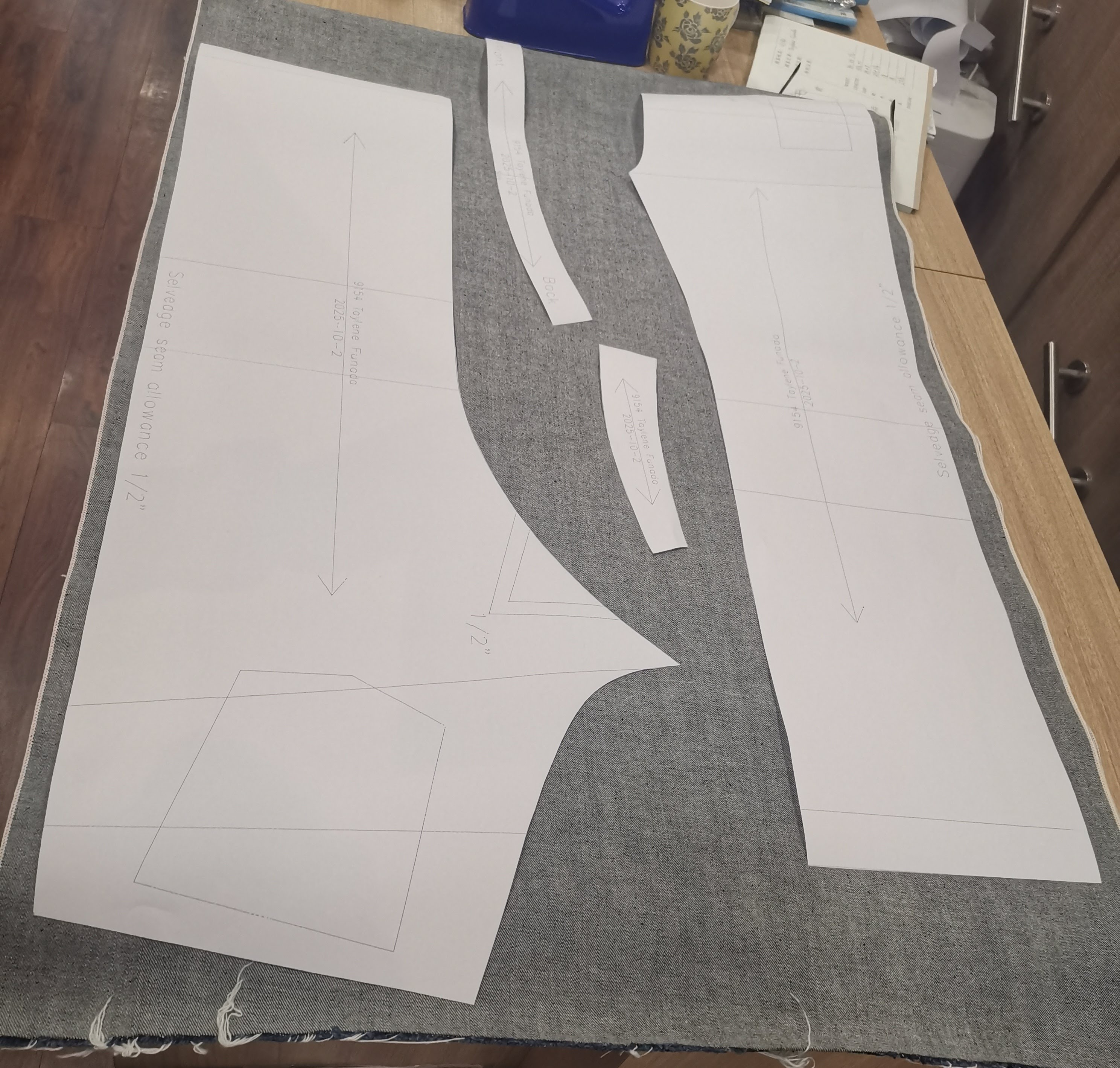 Paper pattern mapped on raw denim